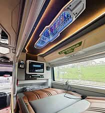 Luxury train interior with modern amenities and panoramic views.