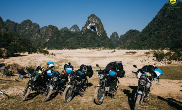 Motorcycle adventure exploring Sapa's stunning valley scenery and rugged mountain trails.