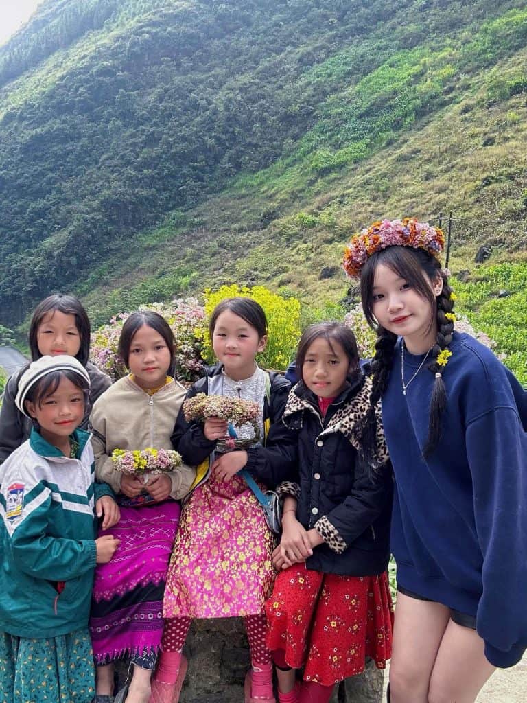 Hanoi village cultural experience with local women in traditional attire.