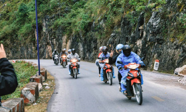 Motorbike tour along scenic mountain road | ViettrendTour.