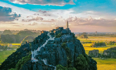 Bai Dinh Pagoda perched atop a scenic mountain offering spiritual serenity and stunning views.