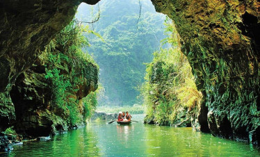 Ha Long Bay cave exploration with boat cruise experience.