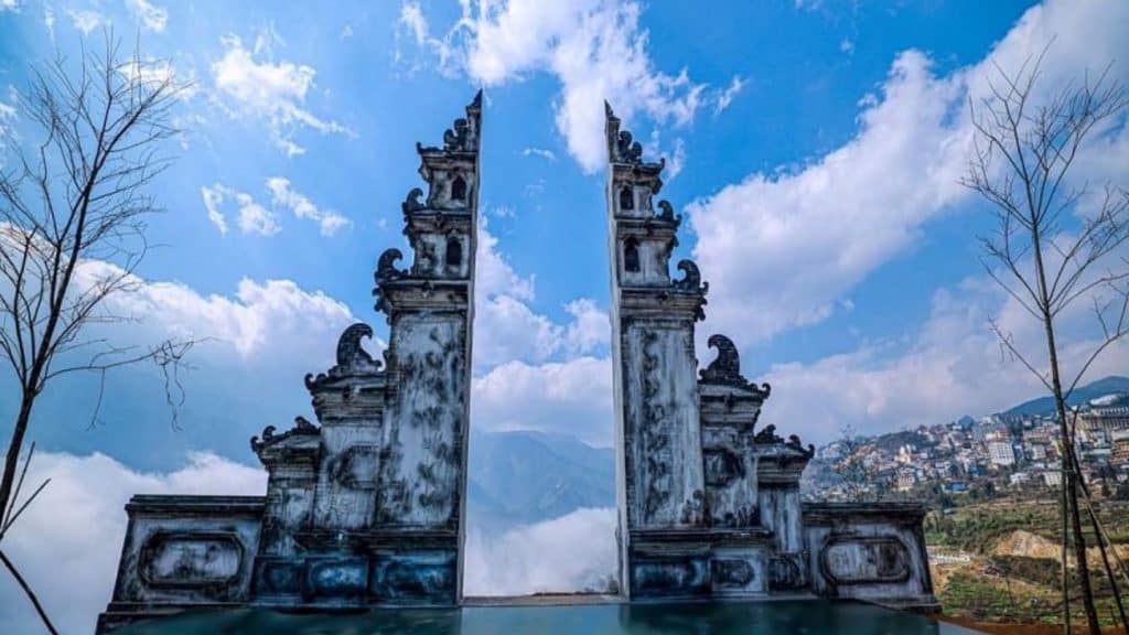 Sun Gate entrance with traditional architecture and mountain views in Sapa, Vietnam.