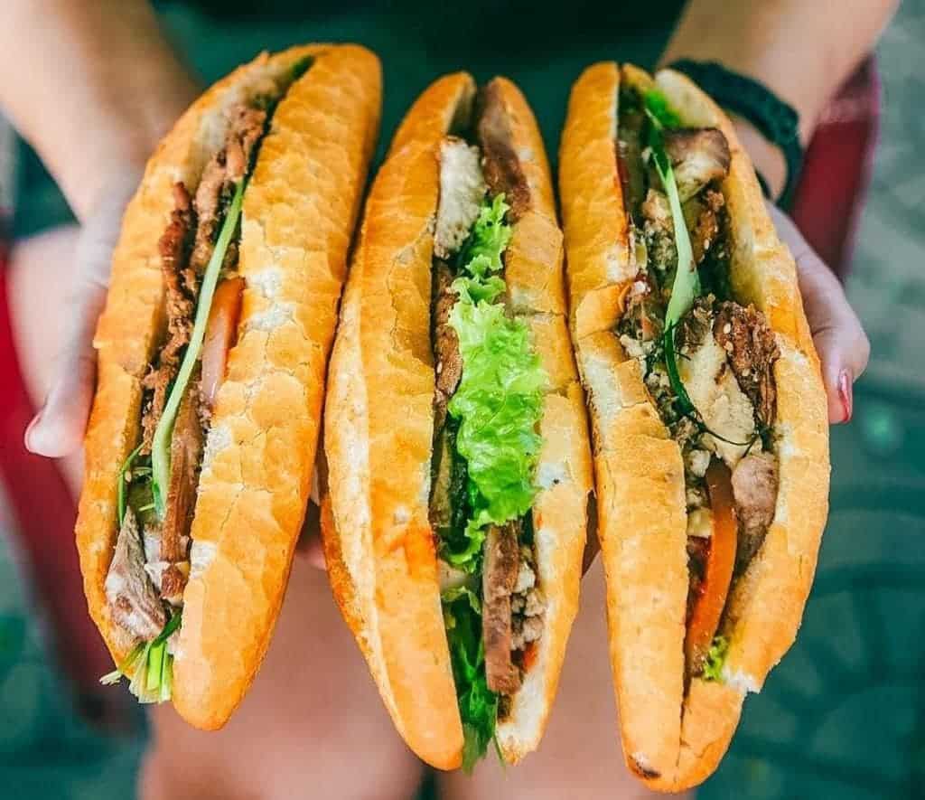 Vibrant banh mi sandwiches showcasing fresh ingredients and crispy bread, perfect for a flavorful Vi.