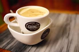 Coffee cup with creamy Vietnamese coffee in a cozy setting, perfect for relaxing and enjoying local.