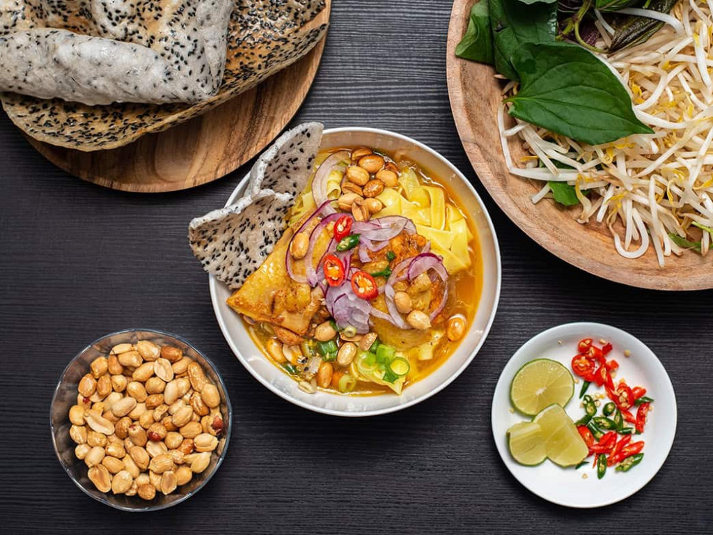 Traditional Vietnamese dishes served with fresh herbs and vibrant flavors.