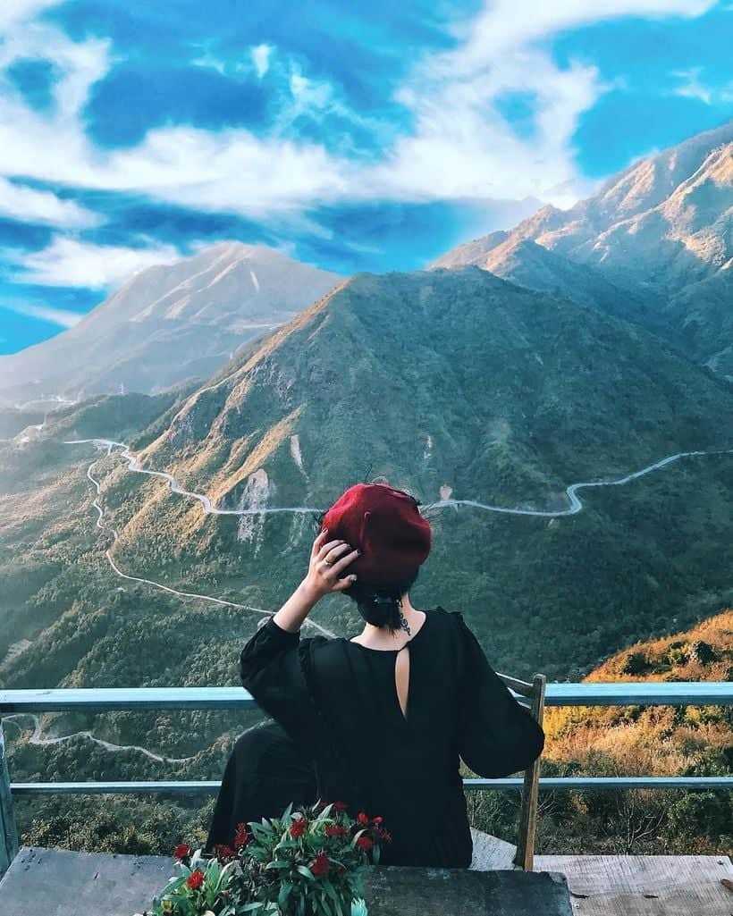 Sapa mountain view with lush green hills and winding paths, perfect for nature lovers.
