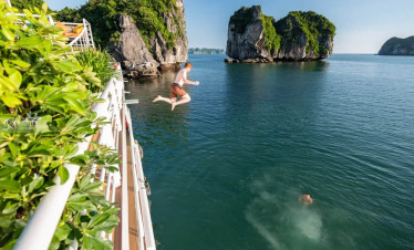 Lan Ha Bay boat jump adventure with stunning limestone islands.