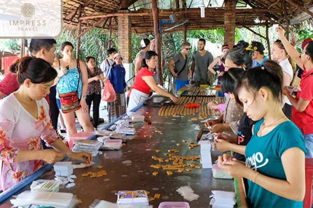 Mekong Delta market experience with local vendors and vibrant scenery.