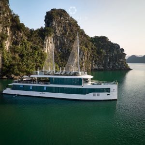 Jade Sails exterior cruising a quiet cove in Halong Bay.