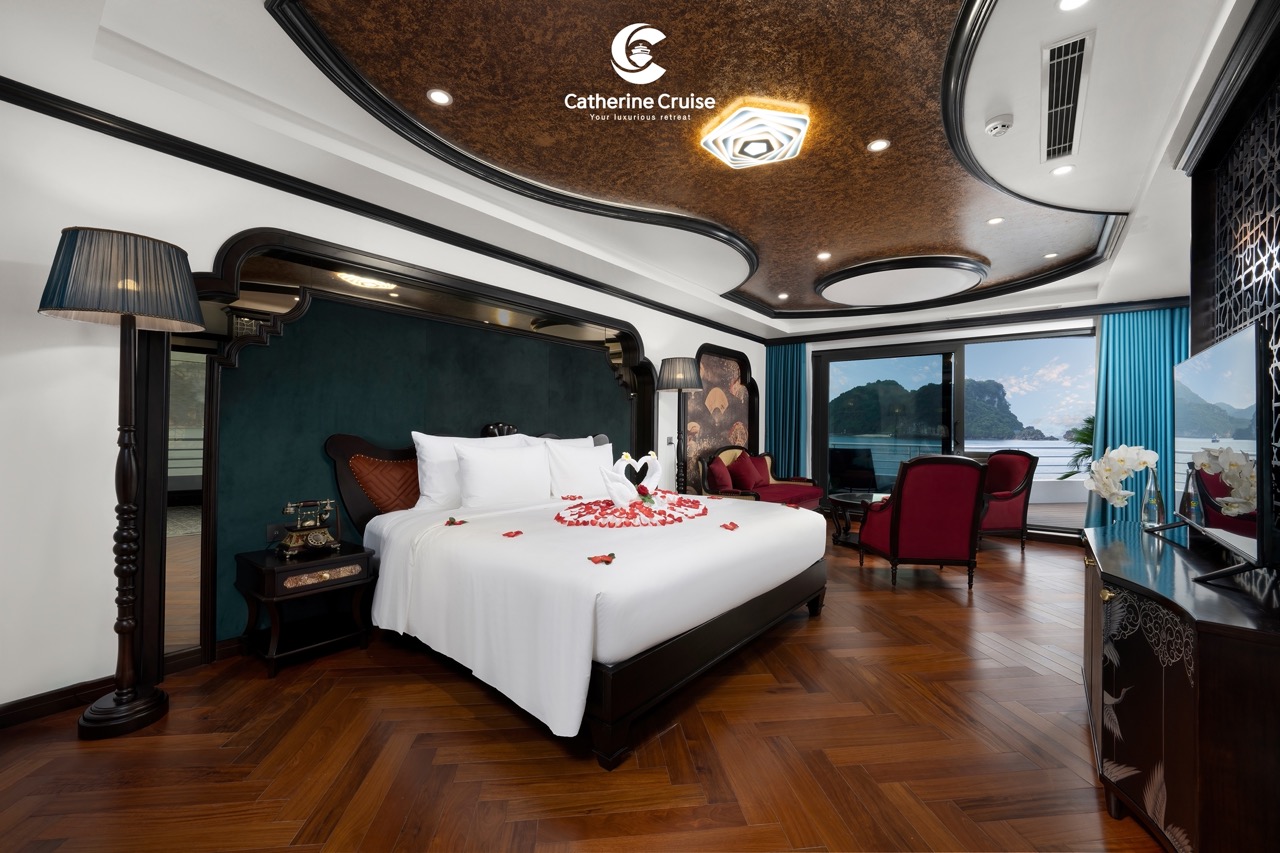 Luxurious cruise cabin with ocean view and elegant decor, perfect for a romantic getaway.