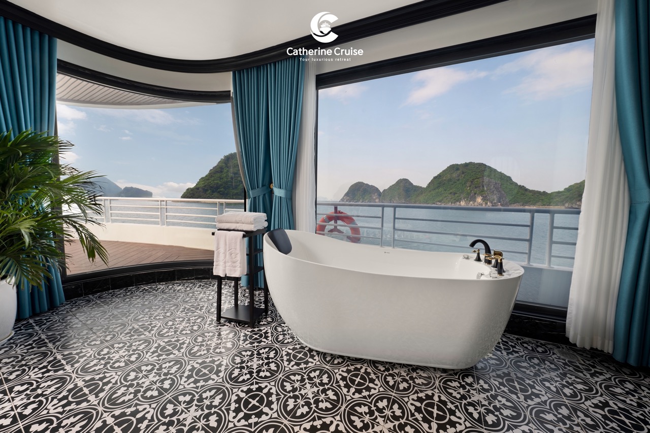 Luxurious ocean-view bathtub with sea scenery and island backdrop at Catherine Cruise retreat.