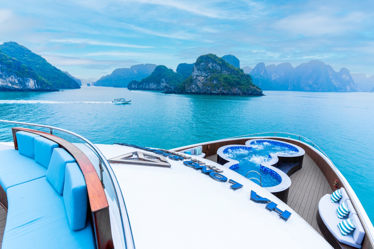 Halong Bay cruise balcony with stunning limestone karsts and tranquil waters, perfect for a luxuriou.