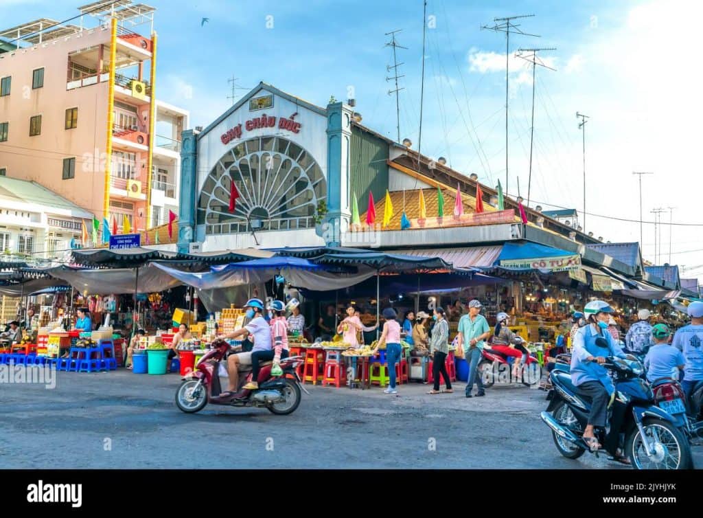 Floating Market Scene in Mekong Delta, Vietnam.