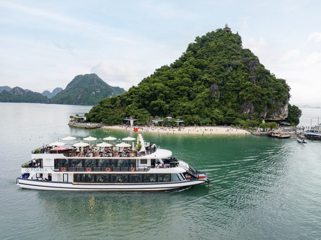 Stunning Halong Bay cruise scene showcasing emerald waters and lush green islands, perfect for luxur.