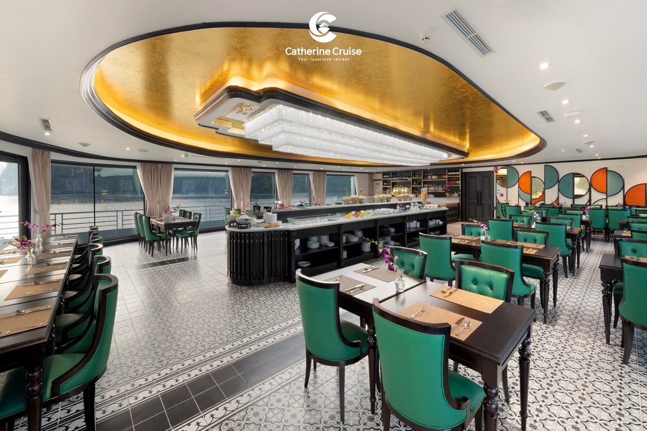 Luxurious cruise restaurant with elegant decor and panoramic water views.