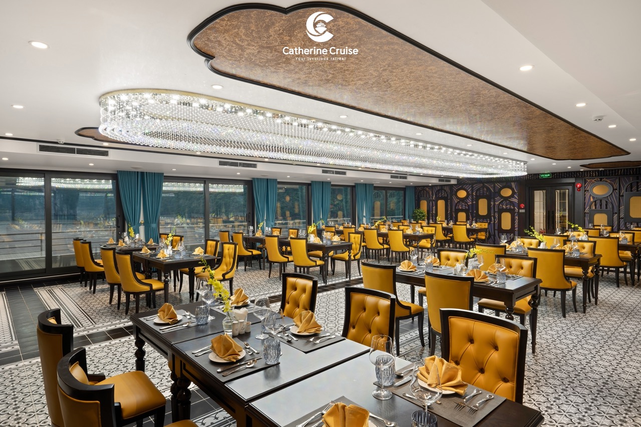 Luxurious restaurant interior with elegant yellow chairs and stylish table settings, perfect for fine dining.