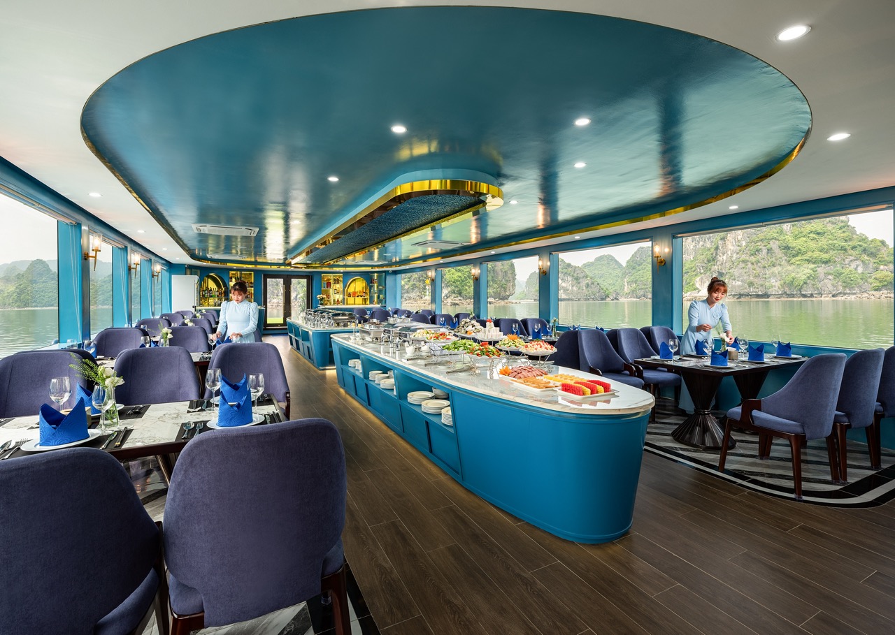 Luxurious cruise balcony with panoramic views of Halong Bay, perfect for relaxing and enjoying sceni.