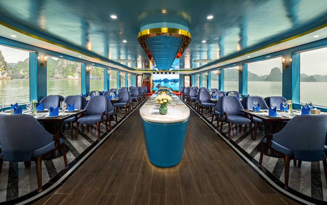 Elegant cruise interior with panoramic views of Halong Bay, perfect for a luxurious day trip.