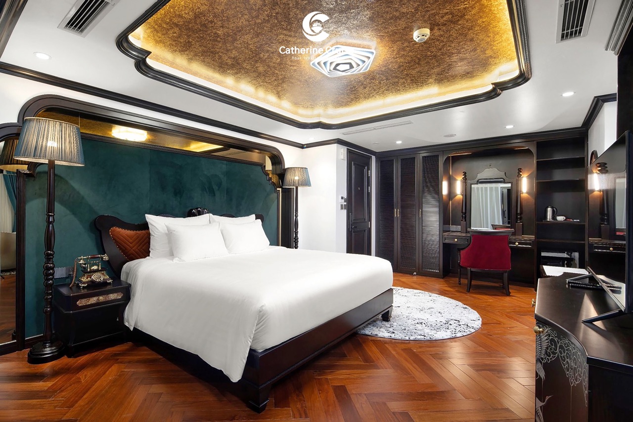 Elegant hotel bedroom with luxurious decor, plush bedding, and sophisticated furniture for a premium stay.