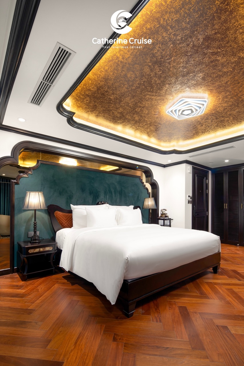 Luxurious hotel bedroom with elegant decor and wooden flooring, perfect for comfort and relaxation.