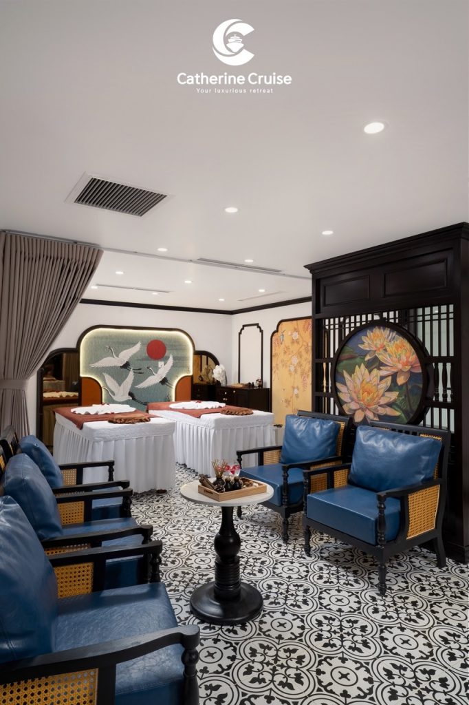 Elegant interior of a luxurious cruise cabin at ViettrendTour, featuring traditional Asian design elements and comfortable seating.