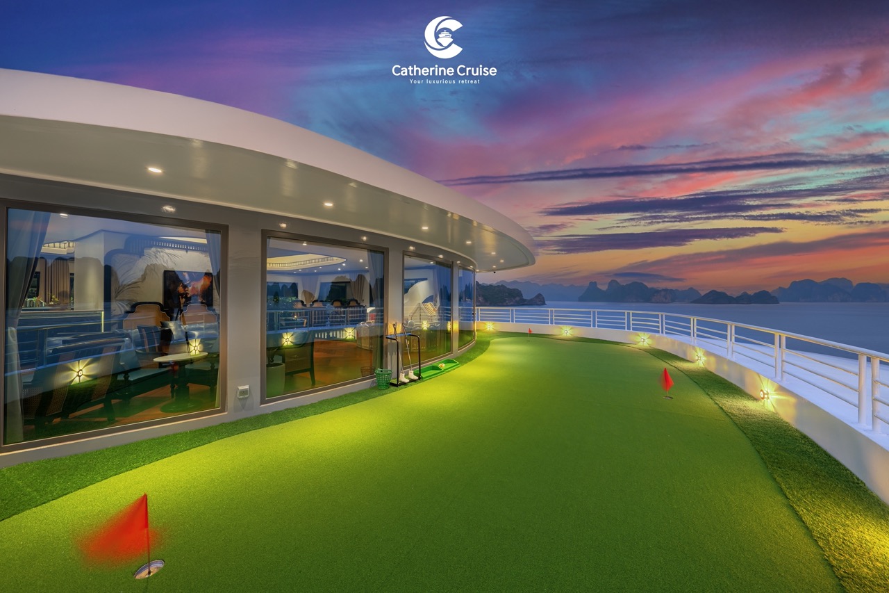 Luxurious cruise deck with panoramic sunset views in Vietnam.
