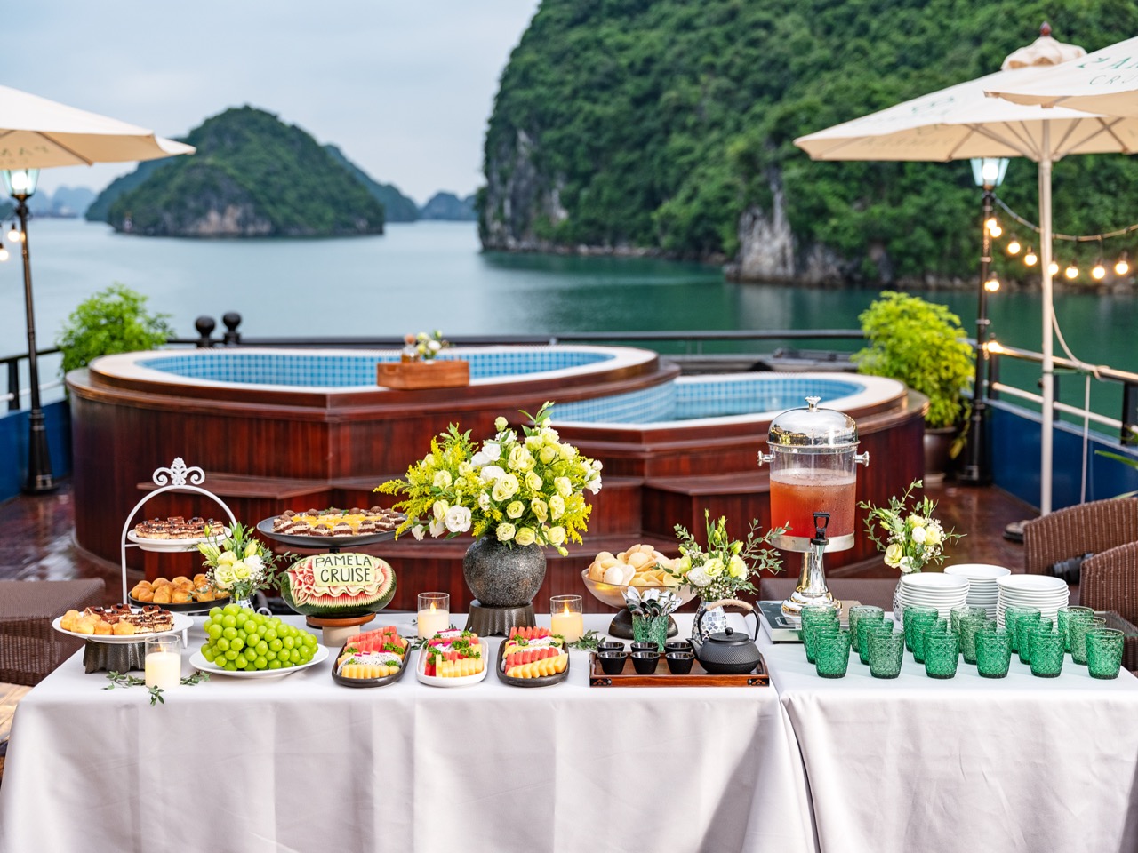 Scenic Halong Bay cruise balcony with lush islands and tranquil waters, perfect for a luxurious trav.