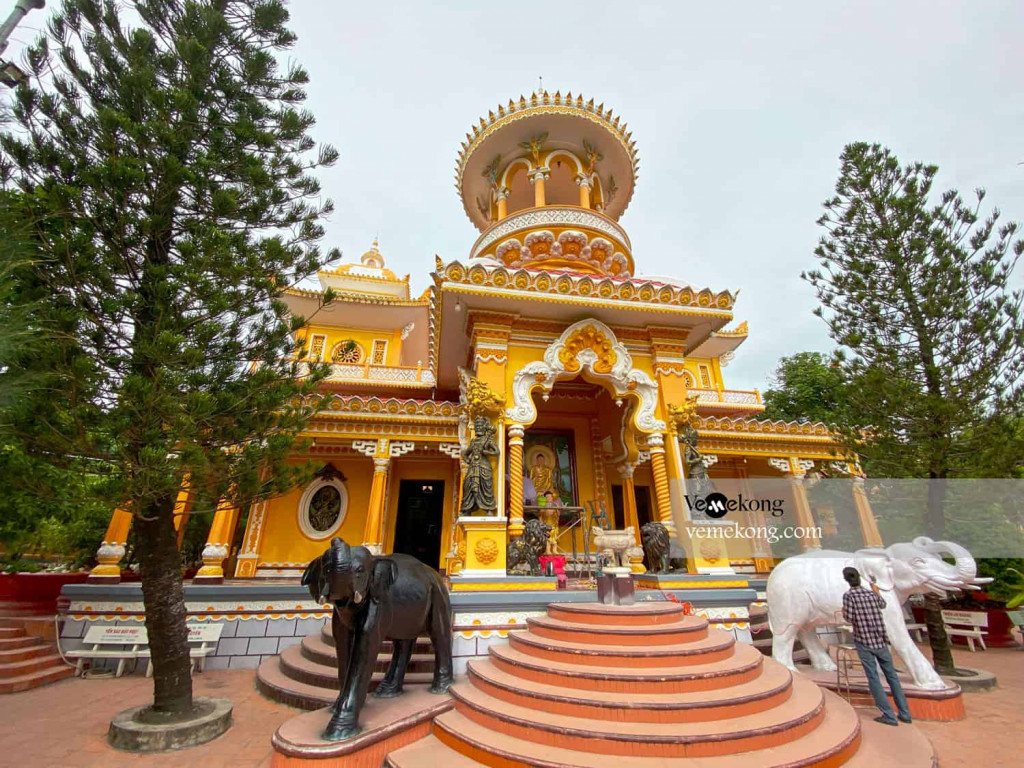 ViettrendTour Mekong Temple - a stunning religious site with intricate architecture and vibrant colo.