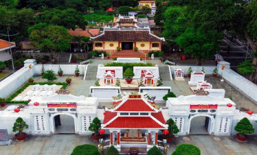 Ancient temple surrounded by lush greenery, offering a peaceful cultural experience.