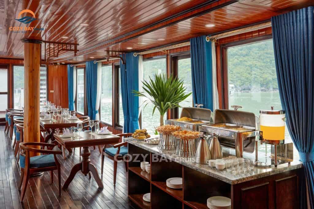 Elegant lounge with lake views and luxurious decor on Cozy Bay Cruise.