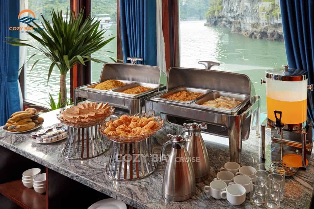 Elegant buffet setup with local delicacies on Cozy Bay Cruise.