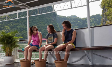 Relaxing on the deck with friends in Halong Bay.
