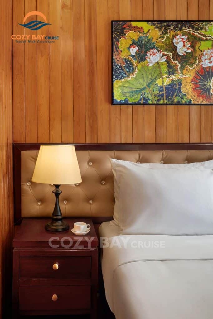 Cozy Bay Cruise luxurious room with warm lighting and elegant decor, perfect for a relaxing Halong B.