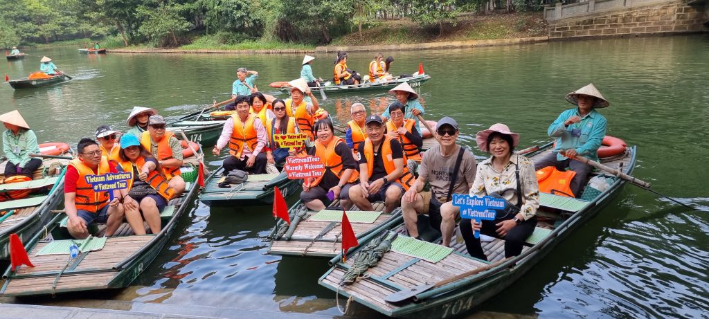 Halong Bay boat tour with scenic views and luxury comfort.