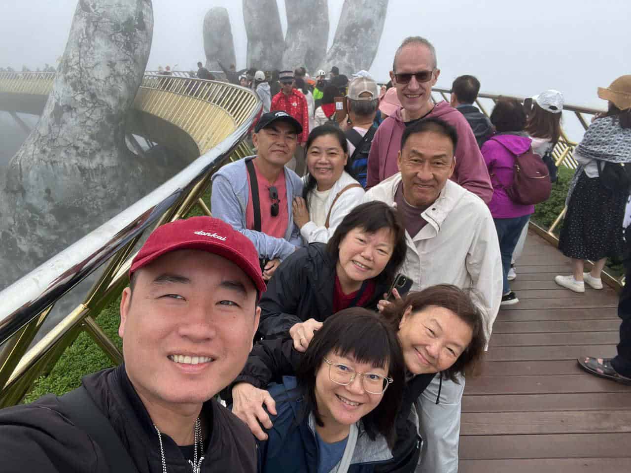 Mount Fansipan scenic view with group of travelers enjoying the adventure.