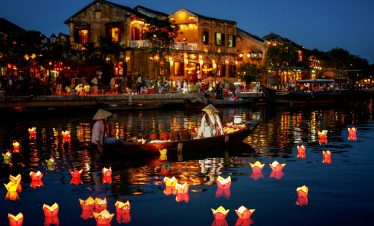 Night lantern floating on Thu Bon River in Hoi An, creating a magical and romantic atmosphere.