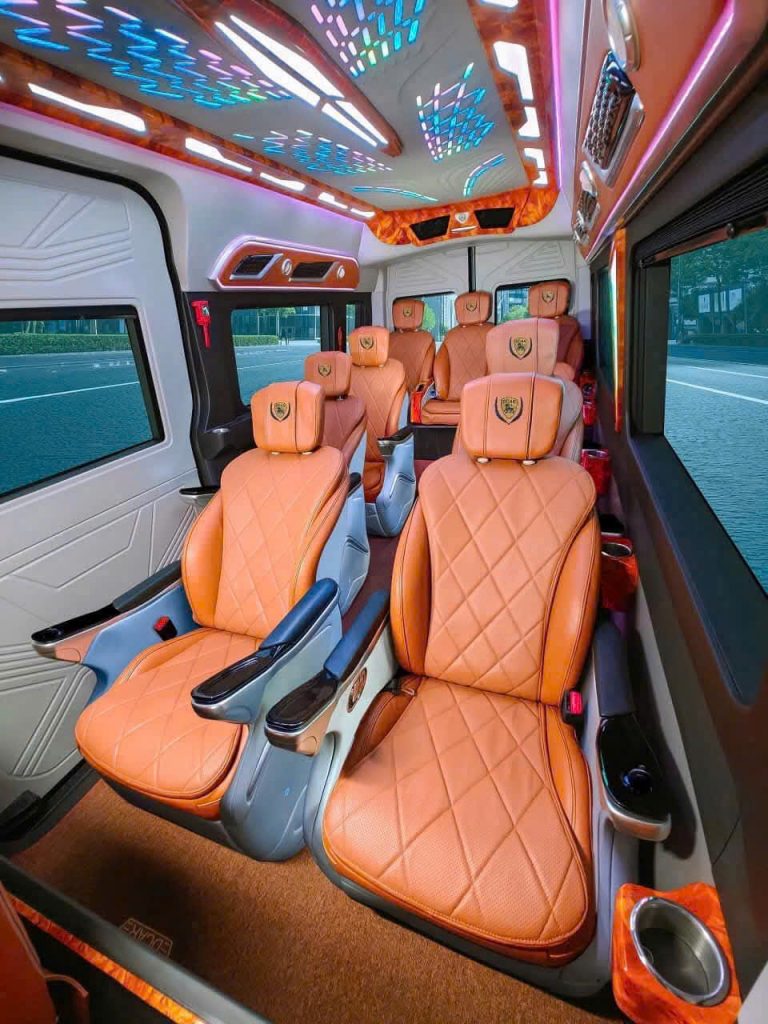 Luxury van interior with comfortable leather seats for Hanoi to Sapa transfer.