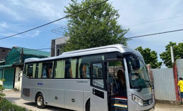 Hanoi to Sapa private transfer bus with comfortable seating and scenic views.