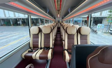Luxury bus interior with comfortable seats for scenic travel.