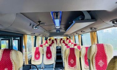Bus interior with comfortable seats and modern amenities.