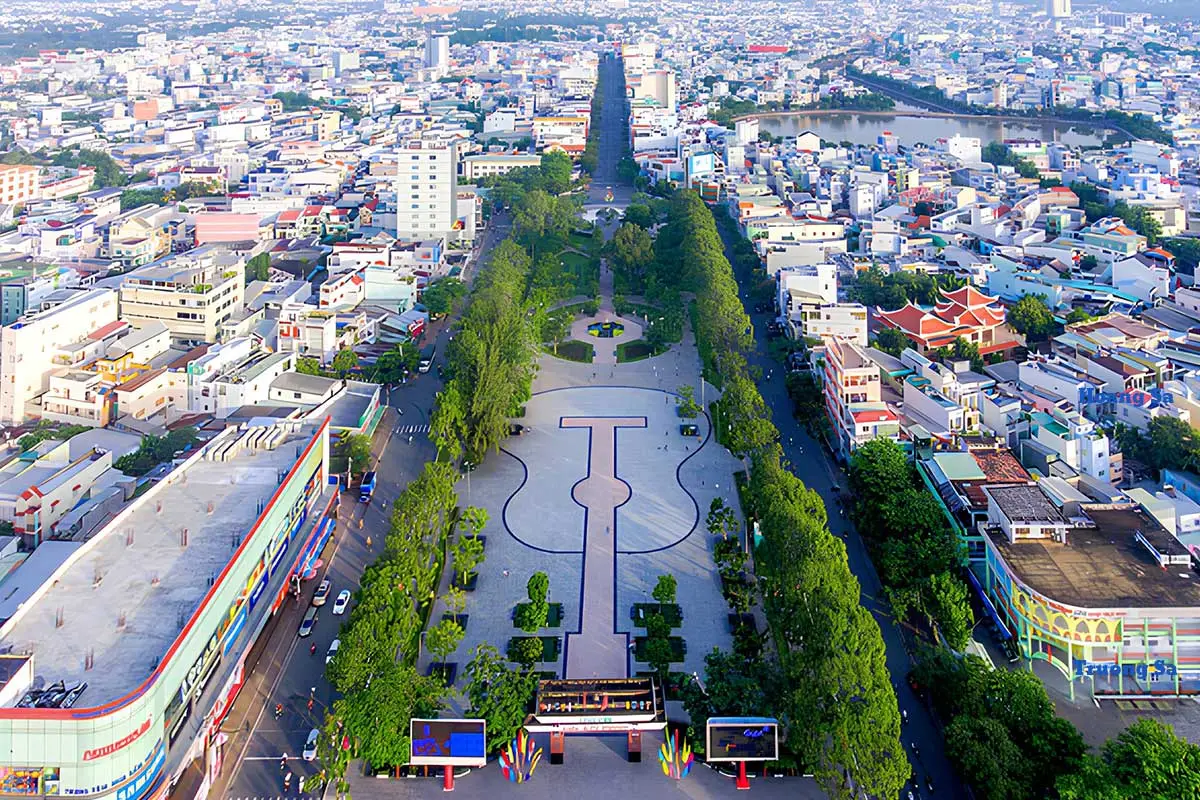 Nguyen Hue Flower Street with vibrant blooms and lively atmosphere in Hanoi's city center.