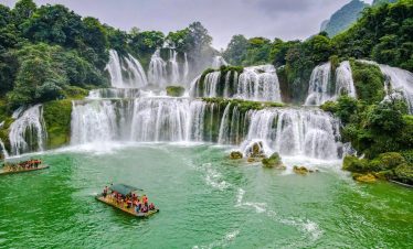 Cao Bang Tours -Stunning Ban Gioc Waterfalls in Vietnam with lush greenery and cascading waters, perfect for nature.