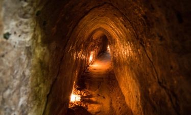 Cave exploration adventure through stunning underground formations in Vietnam.