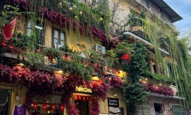 Flower Street Cafe Hanoi - Experience the vibrant charm of Hanoi's lush greenery and cozy ambiance.