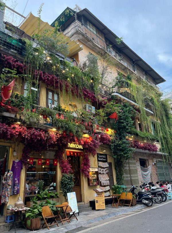 Flower Street Cafe Hanoi - Experience the vibrant charm of Hanoi's lush greenery and cozy ambiance.