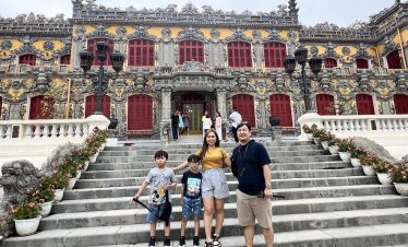Historic Palace Hanoi - Family exploring the stunning architecture and rich history of Vietnam's cap.