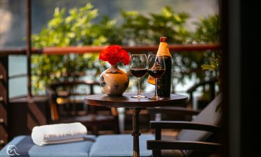 Scenic Lan Ha Bay cruise balcony with stunning views, perfect for a romantic and luxurious Vietnam t.