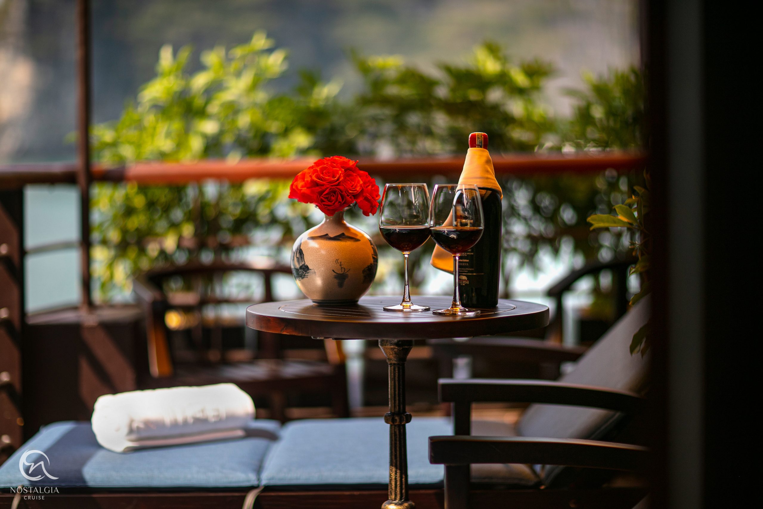 Scenic Lan Ha Bay cruise balcony with stunning views, perfect for a romantic and luxurious Vietnam t.