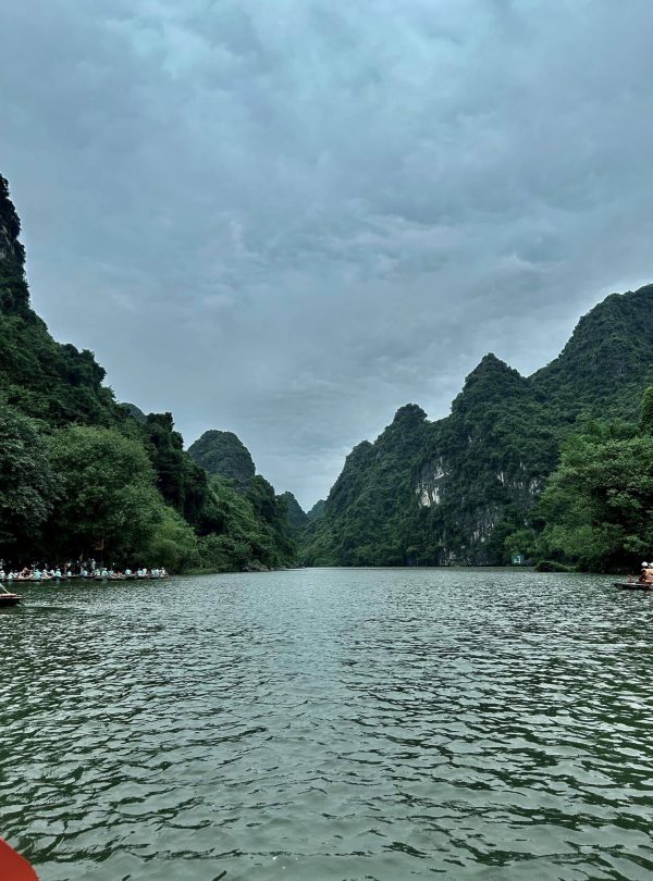 Stunning Lan Ha Bay landscape featuring towering limestone karsts and tranquil waters, perfect for a.